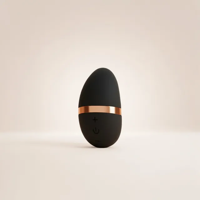 be-happy-lotus-galet-vibrant-clitoridien-noir-et-or-silicone-doux image 1
